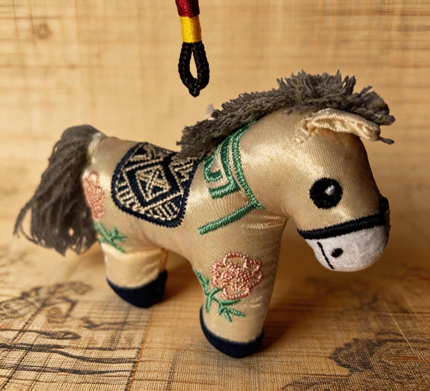 Blue Lucky Horse Charm by JOFAE Kyoto, a handmade Japanese amulet symbolizing travel protection and guidance.
