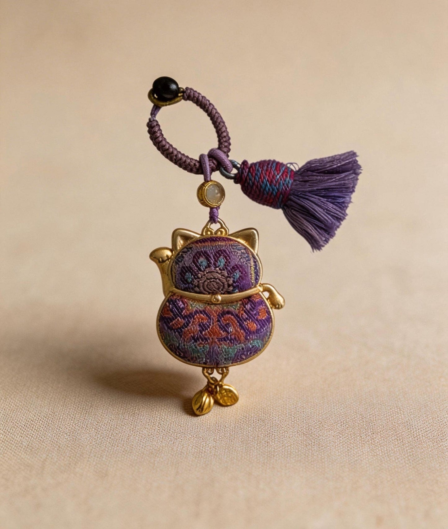 Purple Maneki Neko Lucky Charm from JOFAE Kyoto, handcrafted Japanese amulet symbolizing protection, wisdom, and inner balance.