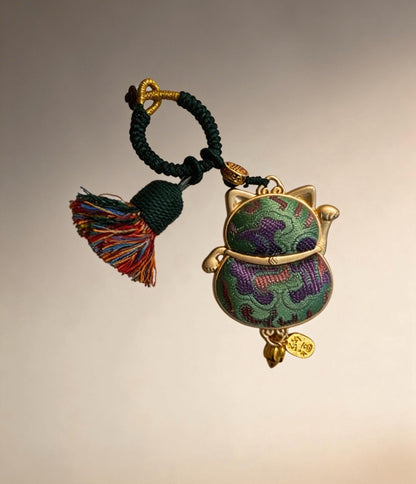 Green Maneki Neko lucky charm from JOFAE Kyoto, a handmade Japanese amulet symbolizing luck, harmony, and balance.