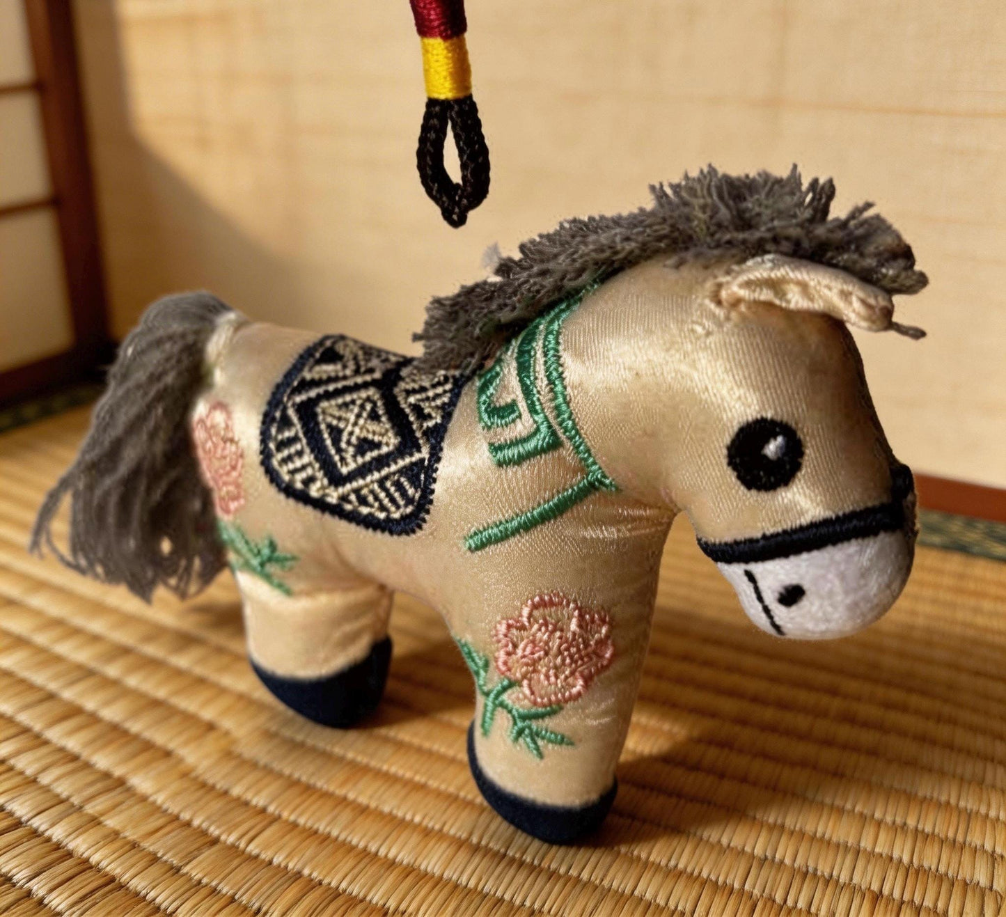 Blue Lucky Horse Charm from JOFAE Kyoto, a handmade Japanese amulet symbolizing travel protection and guidance.