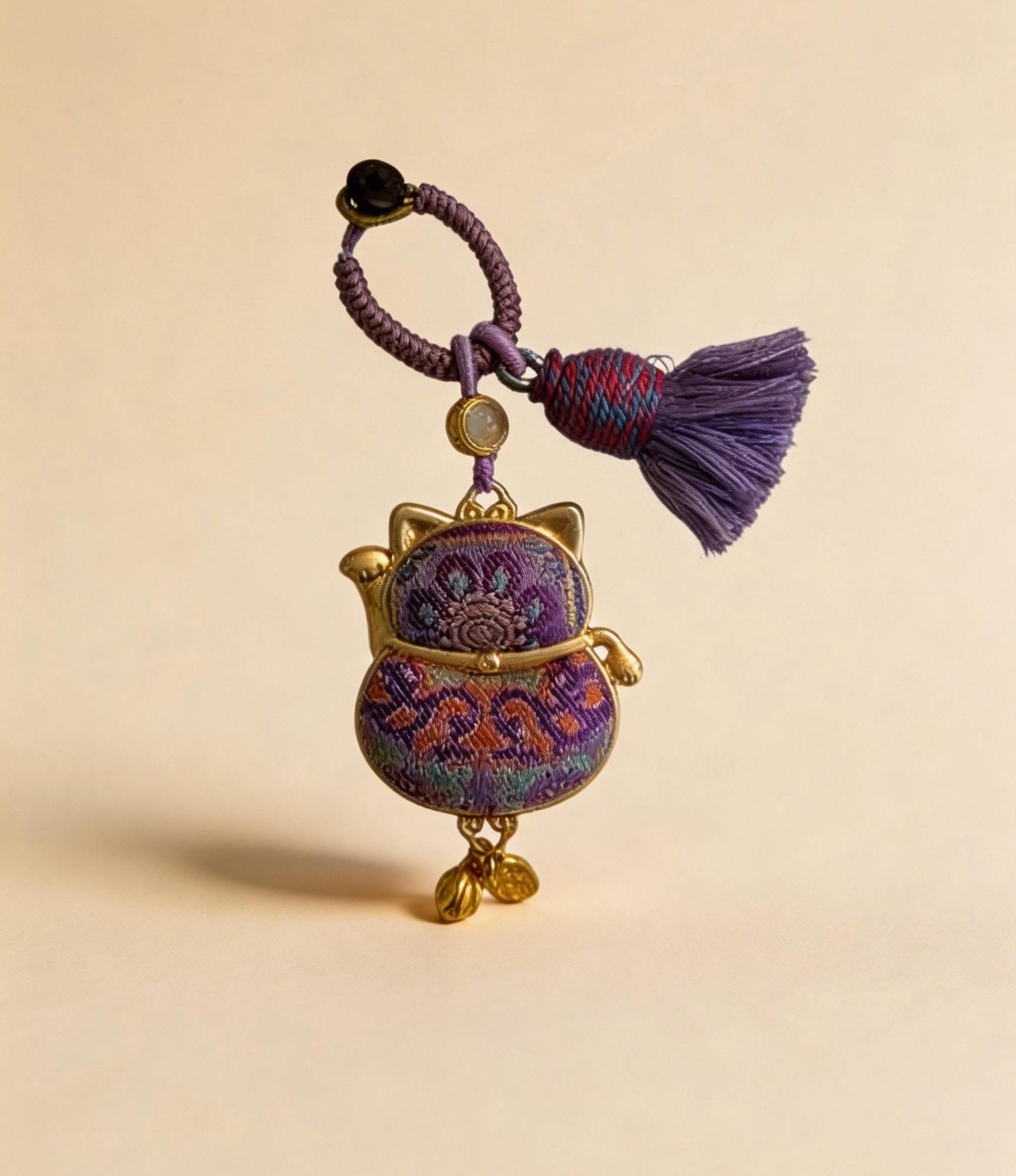 Purple Maneki Neko Lucky Charm from JOFAE Kyoto, a handmade Japanese amulet symbolizing protection, wisdom, and inner balance.