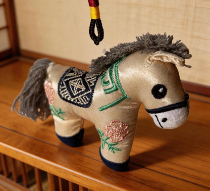 Blue Lucky Horse Charm by JOFAE Kyoto, a handmade Japanese amulet symbolizing travel protection and guidance.