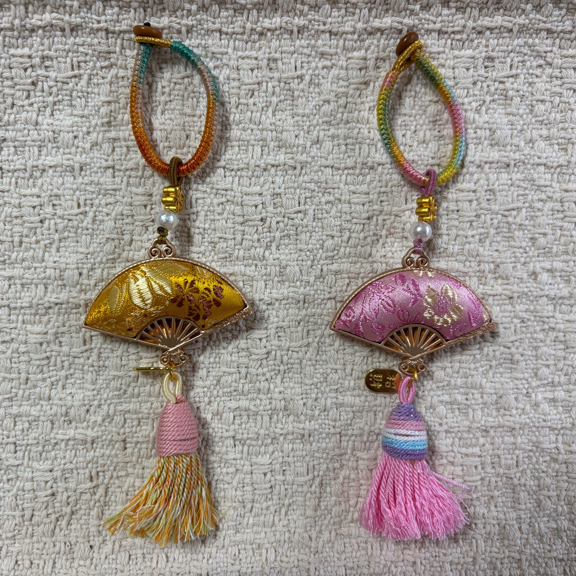 JOFAE Kyoto handmade folding fan charm with tassel, elegant keychain accessory showcasing traditional Japanese design.