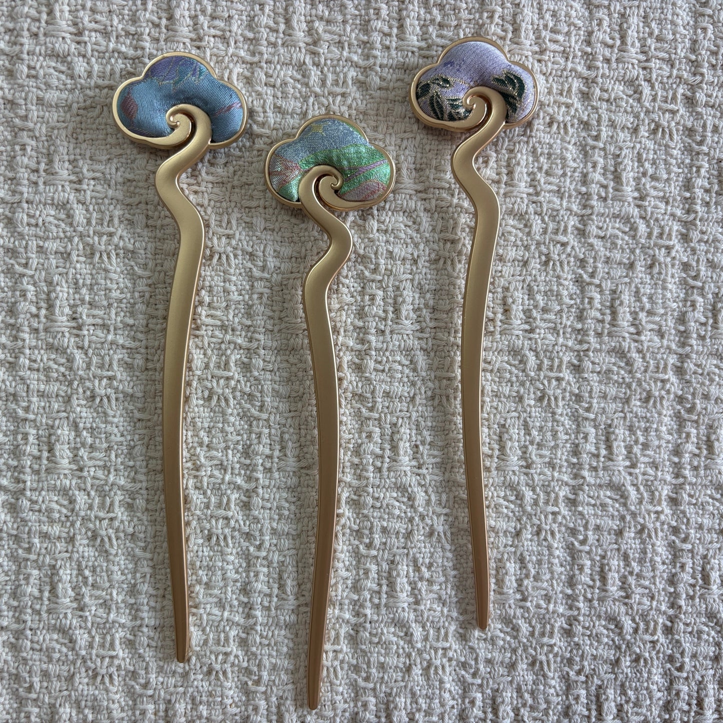 JOFAE Kyoto auspicious cloud hair stick with traditional Chinese brocade design, featuring intricate patterns inspired by ancient Eastern art.