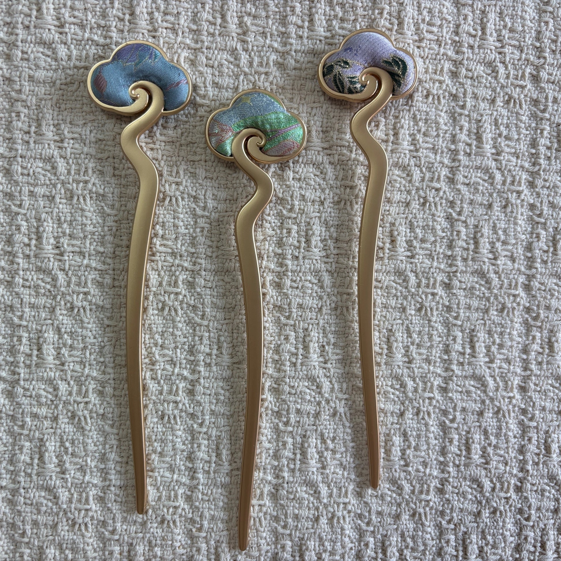 JOFAE Kyoto auspicious cloud hair stick with traditional Chinese brocade design, featuring intricate patterns inspired by ancient Eastern art.
