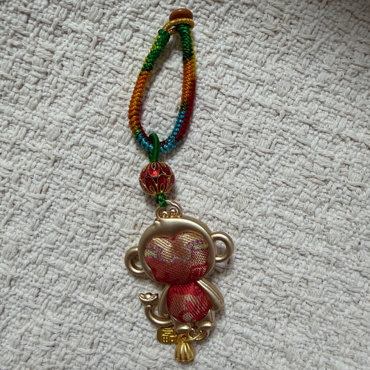 JOFAE Kyoto handmade monkey zodiac keychain with intricate details, serving as a lucky charm for intelligence, joy, and creativity.