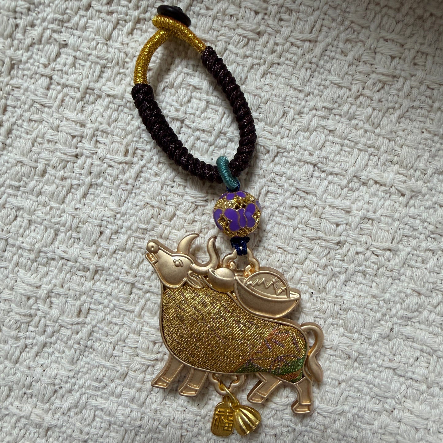JOFAE Kyoto handmade ox zodiac bag charm with intricate design, symbolizing strength, stability, and prosperity as a Chinese zodiac talisman.