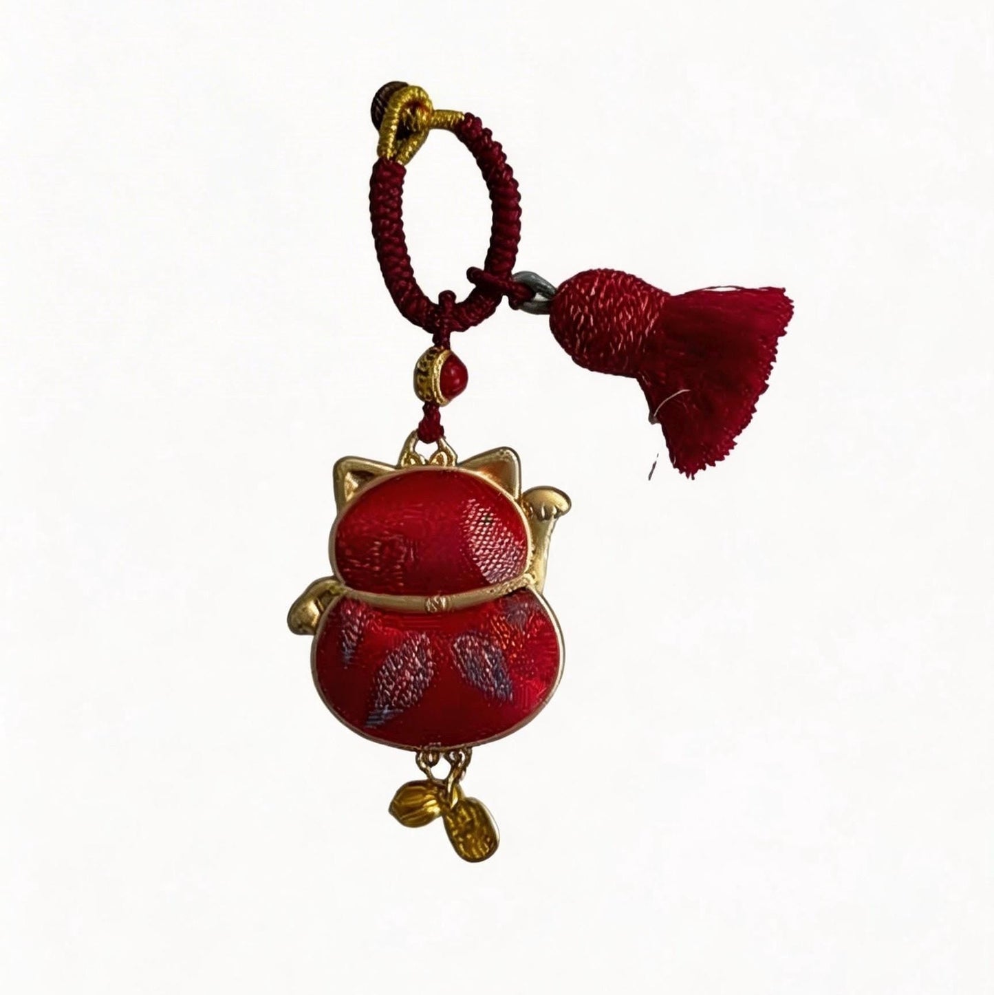 Red Maneki Neko Lucky Charm by JOFAE Kyoto, handmade Japanese cat amulet symbolizing wealth, prosperity, and good fortune.