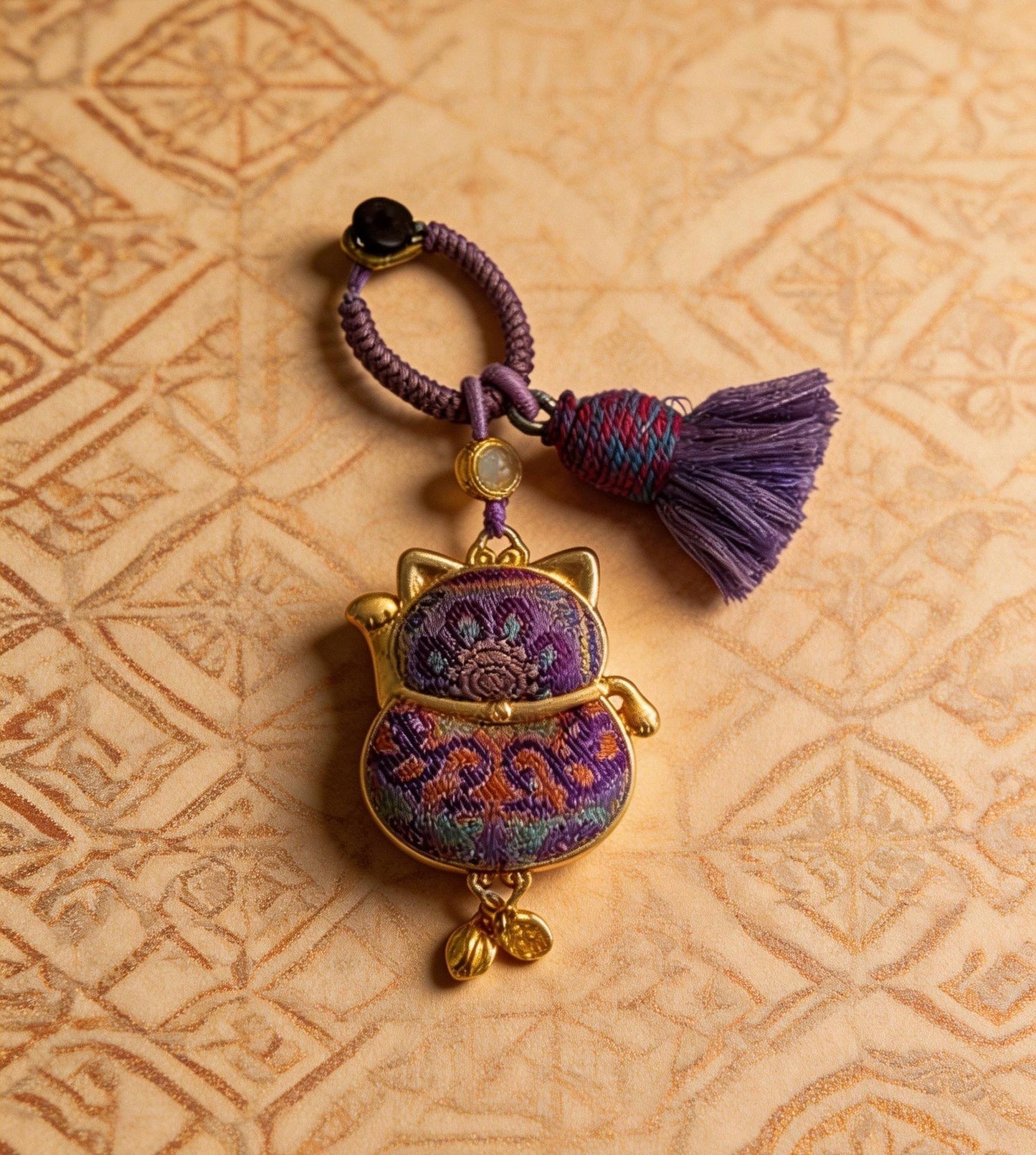 Purple Maneki Neko Lucky Charm by JOFAE Kyoto, handmade Japanese amulet symbolizing protection, wisdom, and inner balance.