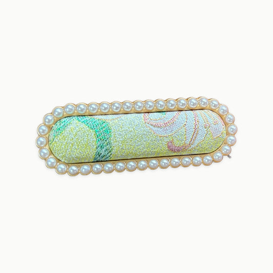 JOFAE brocade statement hair clip with pearl border on a light background
